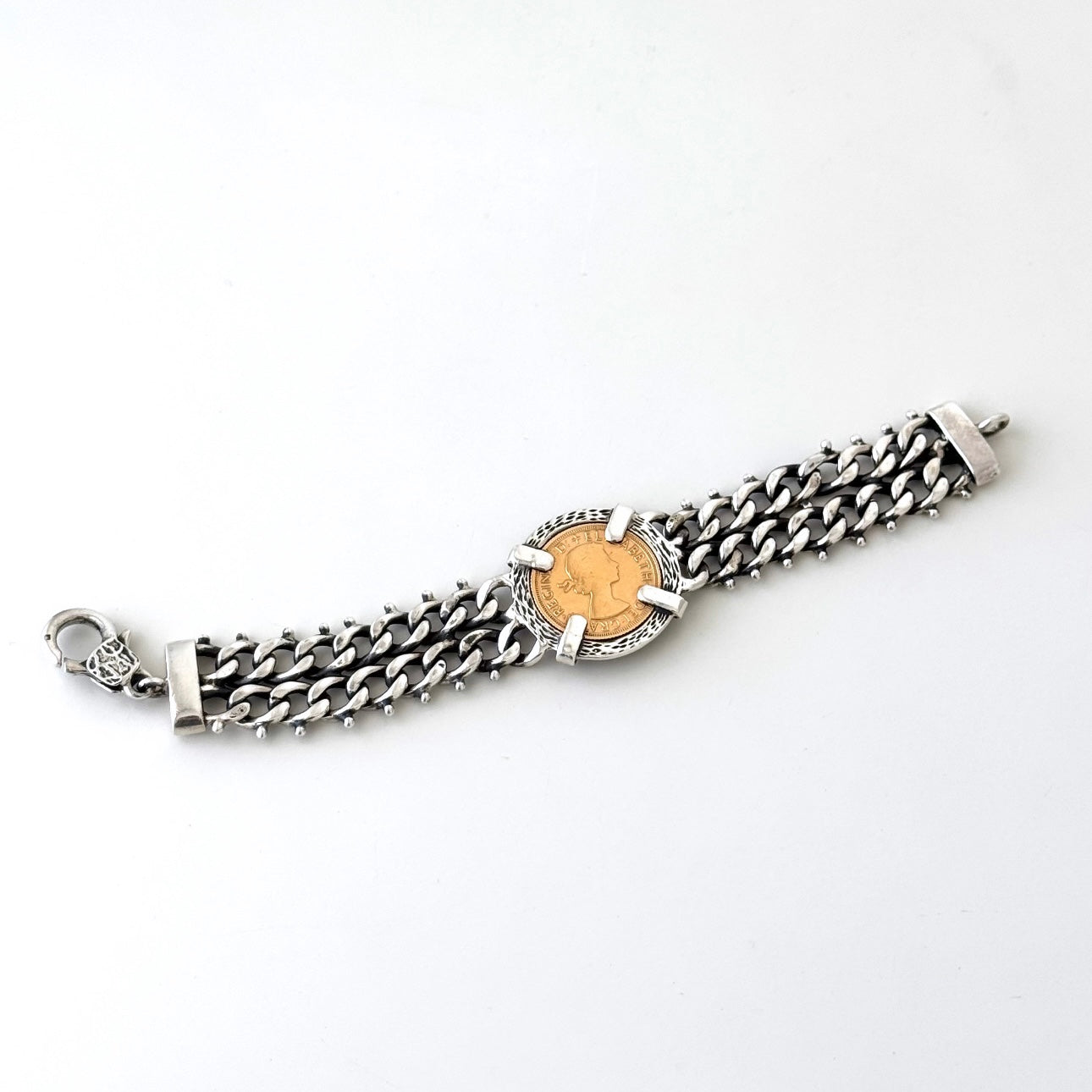 Pulseira com libra em prata